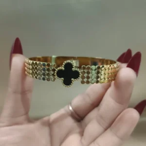 Black and gold clover bangle bracelet
