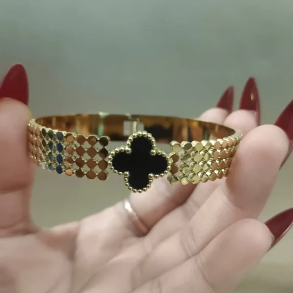 Black and gold clover bangle bracelet